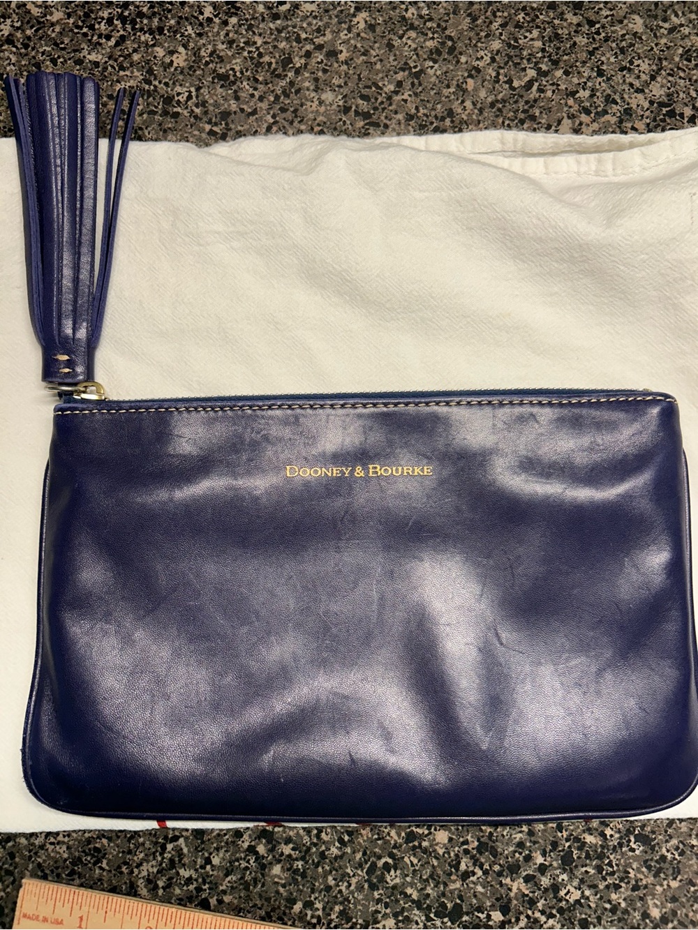 Dooney & Bourke Navy Leather Tassel Zip Wristlet Clutch